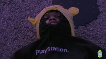 The PlayStation hoodie worn by $NOT in Tell Em's Cochise music video