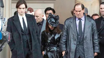 Satin Leather Trench Coat worn by Selina Kyle (Zoë Kravitz) as seen in on the set of the funeral scene in The Batman movie