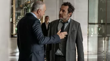 The grey suit worn by Patrick (Gilles Lellouche) in the film Goliath
