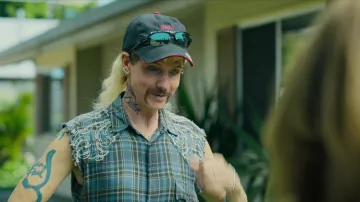 Plaid sleeveless shirt worn by Joe Exotic (John Cameron Mitchell) as seen in Joe vs Carole TV series outfits (Season 1 Episode 8)