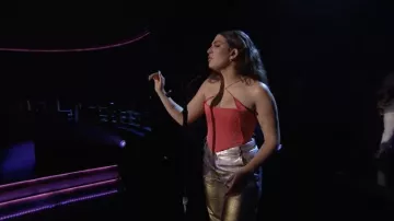 Red strappy top bodypsuit worn by Mae Muller for her live performance at The Tonight Show Starring Jimmy Fallon on March 14, 2022