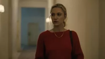 Red sweater worn by Julia (Maika Monroe) as seen in Watcher movie