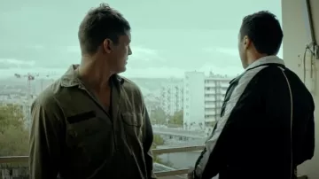 The khaki shirt jacket worn by Christian Lafayette (Niels Schneider) in the film Sentinel South