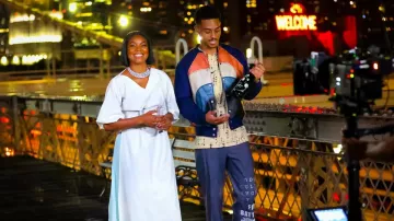 Blue white and red bomber satin jacket worn by Eric (Keith Powers) as seen in The Perfect Find movie wardrobe