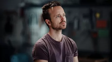 Purple T-shirt worn by Trent (Aaron Paul) as seen in Dual movie