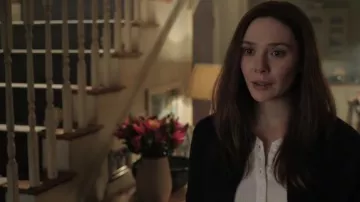 White top with buttons worn by Wanda Maximoff / Scarlet Witch (Elizabeth Olsen) in Doctor Strange in the Multiverse of Madness movie outfits