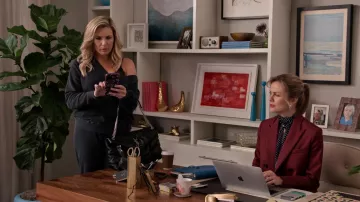 Saint Laurent YSL handbag worn by Brianna Hanson (June Diane Raphael) as seen in Grace and Frankie (S07E09)