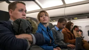 Blue Trench Coat worn by Cassie Bowden (Kaley Cuoco) as seen in The Flight Attendant TV series outfits (Season 2 Episode 6)