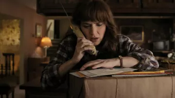 Brown watch worn by Joyce Byers (Winona Ryder) as seen in Stranger Things TV series wardrobe (Season 4 Episode 1)