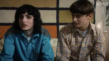 Blue shirt worn by Mike Wheeler (Finn Wolfhard) as seen in Stranger Things TV series (Season 4)