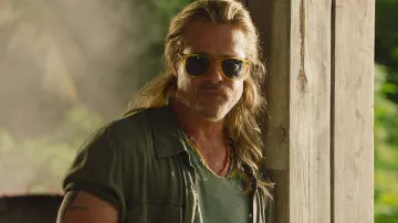 Green Button Up of Jack Trainer (Brad Pitt) in The Lost City