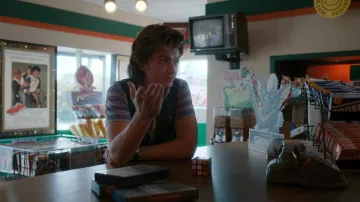 Striped tee worn by Steve Harrington (Joe Keery) as seen in Stranger Things TV series outfits (Season 4 Episode 2)