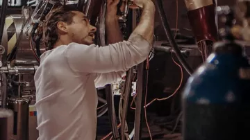 The white working t-shirt worn by Tony Stark (Robert Downey Jr.) in the movie Iron Man