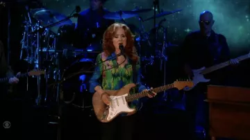 Multicolor printed button down shirt worn by Bonnie Raitt as seen in The Late Show with Stephen Colbert on June 14, 2022