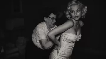 White off shoulder combi short dress worn by Norma Jeane / Marilyn Monroe (Ana de Armas) in Blonde movie outfits