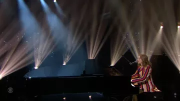 Striped jacket worn by Regina Spektor as seen in The Late Show with Stephen Colbert on June 16, 2022