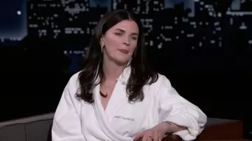 Gold earrings worn by Aisling Bea as seen in Jimmy Kimmel Live! on June 21, 2022