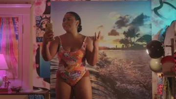 Orange Floral Swimsuit worn by Addie (Anjelika Washington) as seen in Love & Gelato