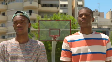 Striped t-shirt worn by Giannis Antetokounmpo (Uche Agada) as seen in Rise movie