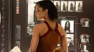 Orange & red halter dress of Charlotte Hale (Tessa Thompson) in Westworld (S01E08)