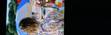 Chemise fleurie avec oiseaux de Emma (Raphaële Volkoff) dans Camping paradis (S12E01)