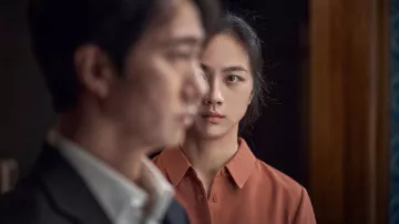 Rust shirt jacket worn by Seo-rae (Tang Wei) as seen in Decision to Leave movie