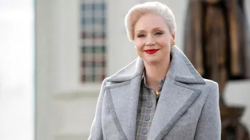 Grey coat worn by Larissa Weems (Gwendoline Christie) as seen in Wednesday TV series outfits (Season 1)