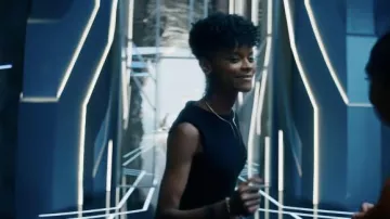 Black bodycon dress worn by Shuri (Letitia Wright) as seen in Black Panther: Wakanda Forever movie outfits