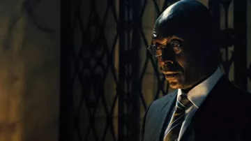Striped tie worn by Charon (Lance Reddick) as seen in John Wick: Chapter 4