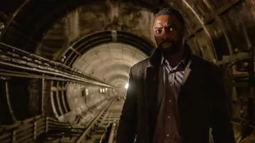 Grey Trench Coat worn by John Luther (Idris Elba) as seen in Luther movie