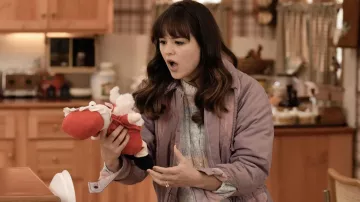 Light pink jacket worn by Erica Goldberg (Hayley Orrantia) as seen in The Goldbergs TV show (S10E09)