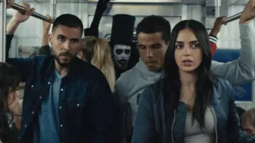 Blue leather bomber jacket worn by Sam Carpenter (Melissa Barrera) as seen in Scream 6