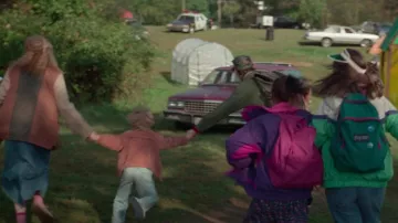 JanSport Backpack in green worn by a child as seen in White Noise