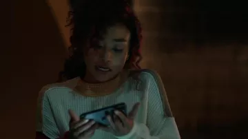Sweater worn by Hannah Kim (Tati Gabrielle) as seen in Kaleidoscope (S01E06)