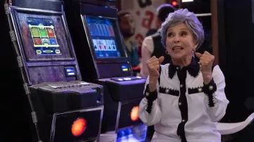 Black and white shirt worn by Dolores (Rita Moreno) as seen in Lopez vs. Lopez (S01E09)