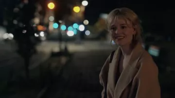 The beige trench coat worn by Audrey Hope (Emily Alyn Lind) in the series Gossip Girl (S01E07)