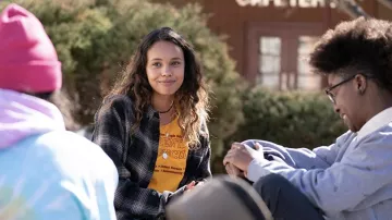 Orange yellow tee worn by Lila (Alisha Boe) as seen in When You Finish Saving The World