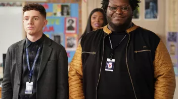 Black and yellow bomber jacket worn by Zach (Larry Owens) as seen in Abbott Elementary (S02E15)