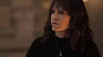 Green pendant necklace worn by Eileen Fitzgerald (Hilary Swank) as seen in Alaska Daily (S01E07)
