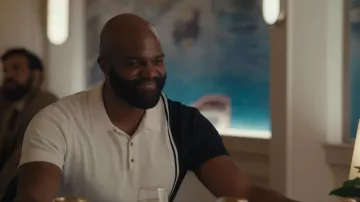 Black and white polo shirt worn by Marcus (Carl Clemons-Hopkins) in Hacks (S01E08)