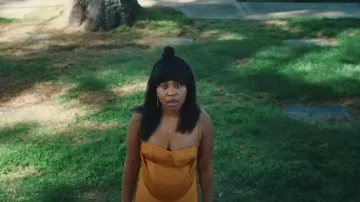 Orange dress worn by Dre (Dominique Fishback) as seen in Swarm TV series wardrobe (Season 1)