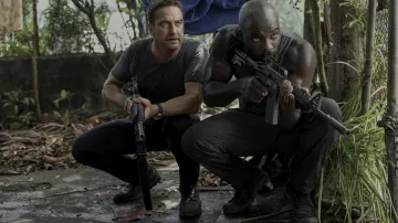 Tactical boots worn by Louis Gaspare (Mike Colter) as seen in Plane