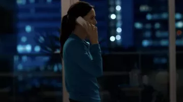 Blue polo sweater worn by Gale Weathers (Courteney Cox) as seen in Scream VI