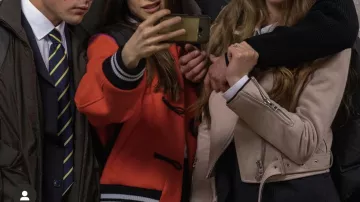 Red and pink bomber worn by Camilla in the Netflix series Baby