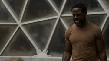 Brown Sports T-shirt worn by Ray (Sterling K. Brown) as seen in Biosphere movie