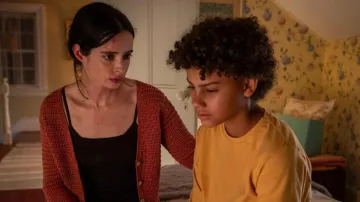 Mesh cardigan worn by Lucy (Krysten Ritter) as seen in Orphan Black: Echoes TV series outfits (Season 1)