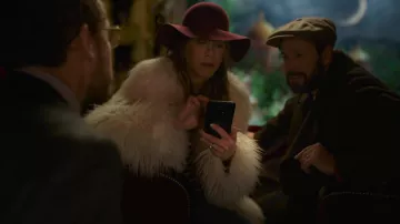 Red hat worn by Audrey (Jennifer Aniston) as seen in Murder Mystery 2 movie wardrobe