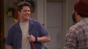 Purple shirt worn by Quinten (Matt Shively) as seen in Lopez vs Lopez (Season 1 Episode 17)