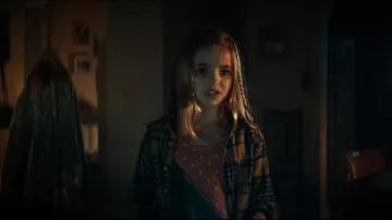 Plaid shirt worn by Kassie (Nell Fisher) as seen in Evil Dead Rise movie