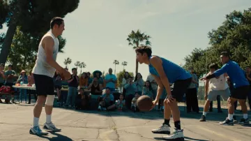 White hi top sneakers worn by Edwin (Justin H. Min) as seen in Beef (S01E06)